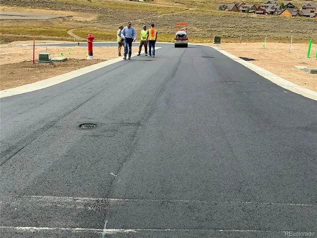 a view of a city with tall buildings