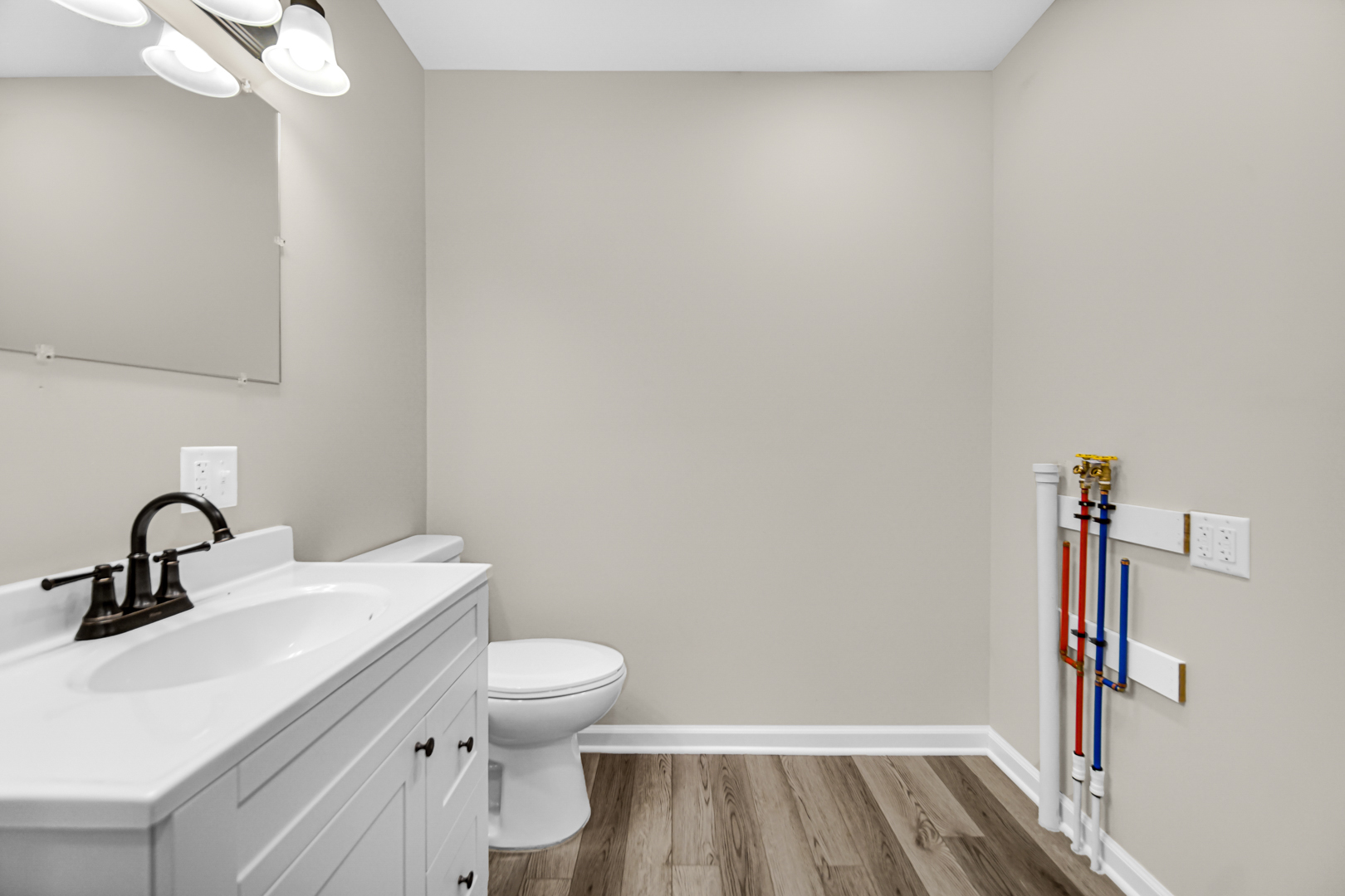 6226 East 250S Road St. Anne, IL 60964 - Photo 14 of 22 a bathroom with a sink toilet and vanity