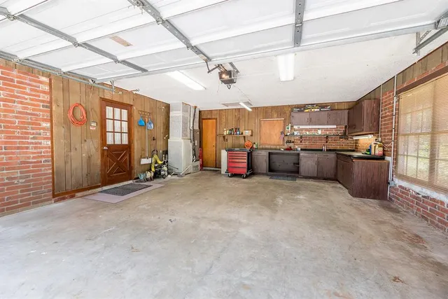 a view of a hallway with windows