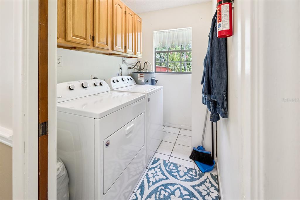 8991 Northwest 115th Street Chiefland, FL 32626 - Photo 36 of 49 a utility room with dryer and washer