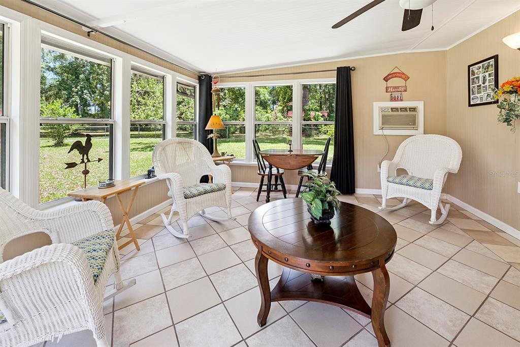 8991 Northwest 115th Street Chiefland, FL 32626 - Photo 39 of 49 a living room with furniture and a window