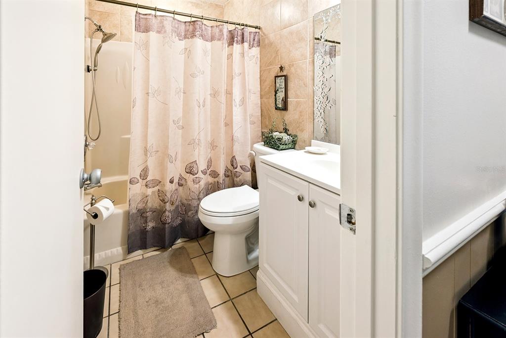 8991 Northwest 115th Street Chiefland, FL 32626 - Photo 45 of 49 a bathroom with a toilet and a shower