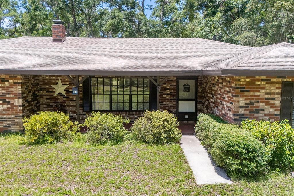 8991 Northwest 115th Street Chiefland, FL 32626 - Photo 5 of 49 a view of a house with garden