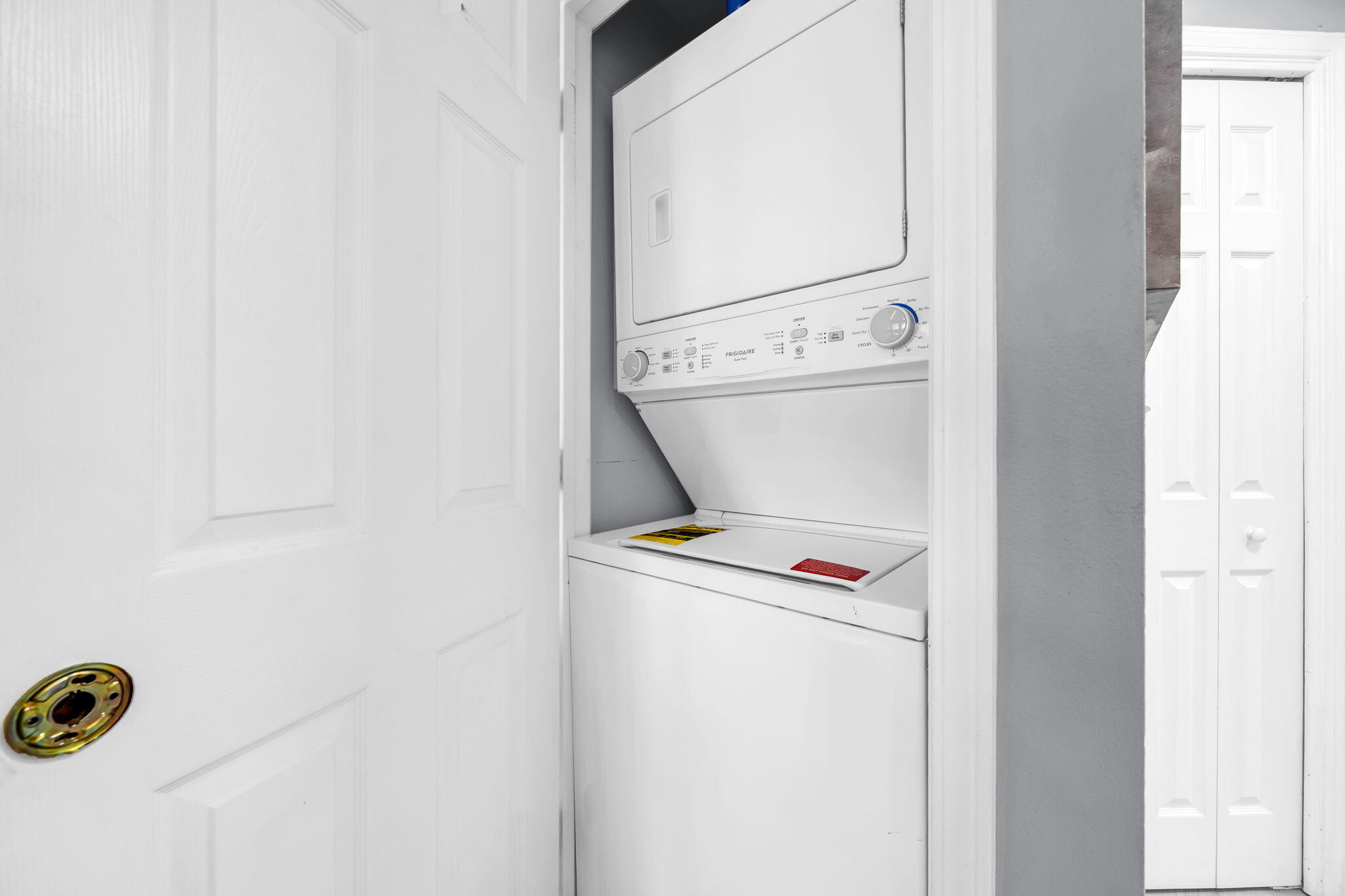 117 Village Boulevard, Unit 711 Santa Rosa Beach, FL 32459 - Photo 13 of 47 a utility room with dryer and washer