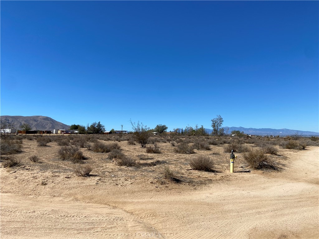 2 La Plata Road Apple Valley, CA 92308 - Photo 1 of 1 a view of houses with a outdoor space