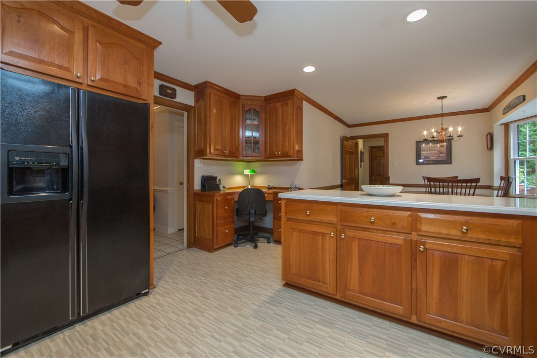 13639 Solstice Cl Midlothian, VA 23113 - Photo 11 of 46 a kitchen with stainless steel appliances granite countertop a refrigerator a sink and wooden cabinets