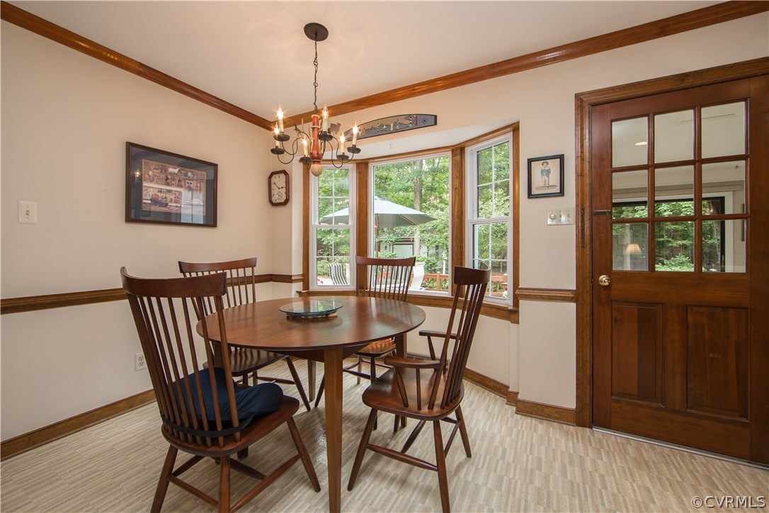 13639 Solstice Cl Midlothian, VA 23113 - Photo 13 of 46 a view of a dining room with furniture window and outside view