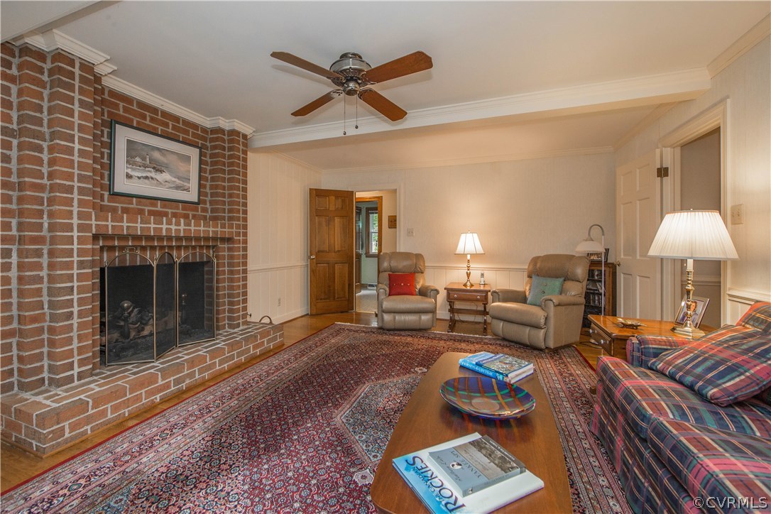 13639 Solstice Cl Midlothian, VA 23113 - Photo 16 of 46 a living room with furniture and a fireplace