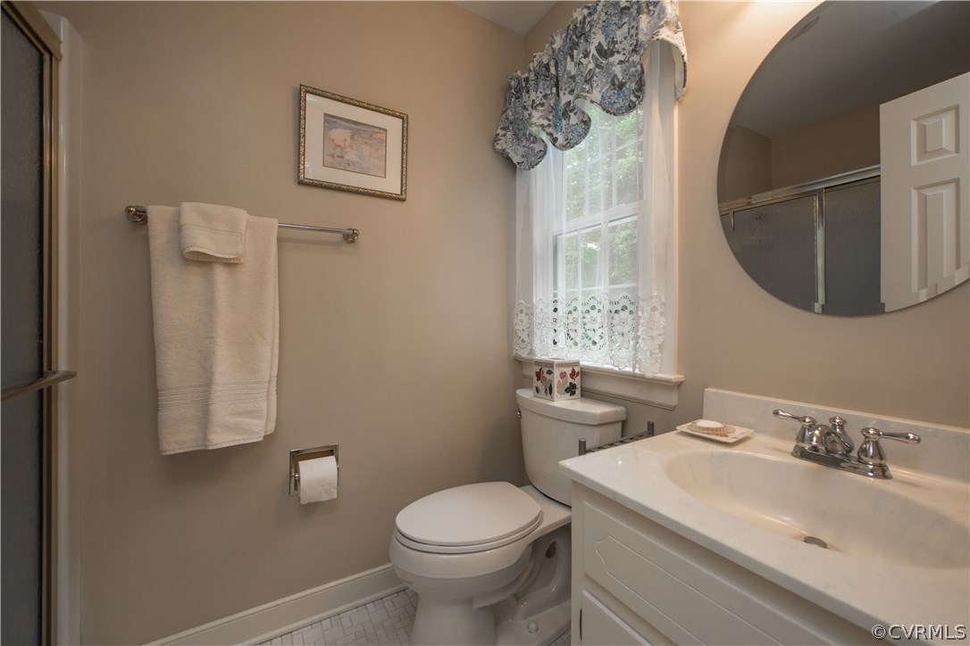 13639 Solstice Cl Midlothian, VA 23113 - Photo 25 of 46 a bathroom with a sink toilet and a mirror