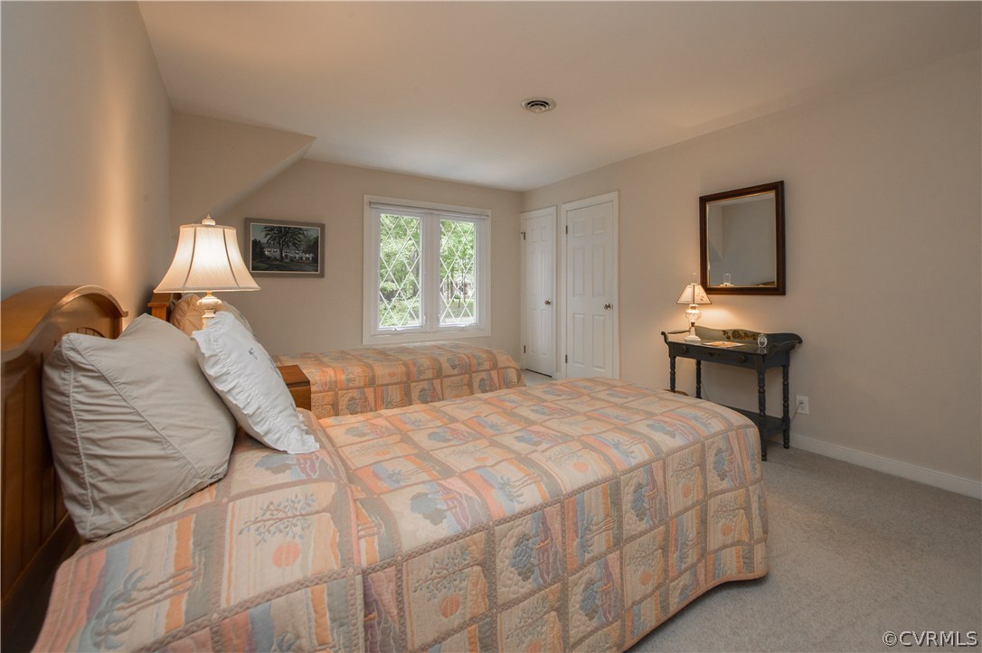 13639 Solstice Cl Midlothian, VA 23113 - Photo 28 of 46 a bedroom with a bed and a window