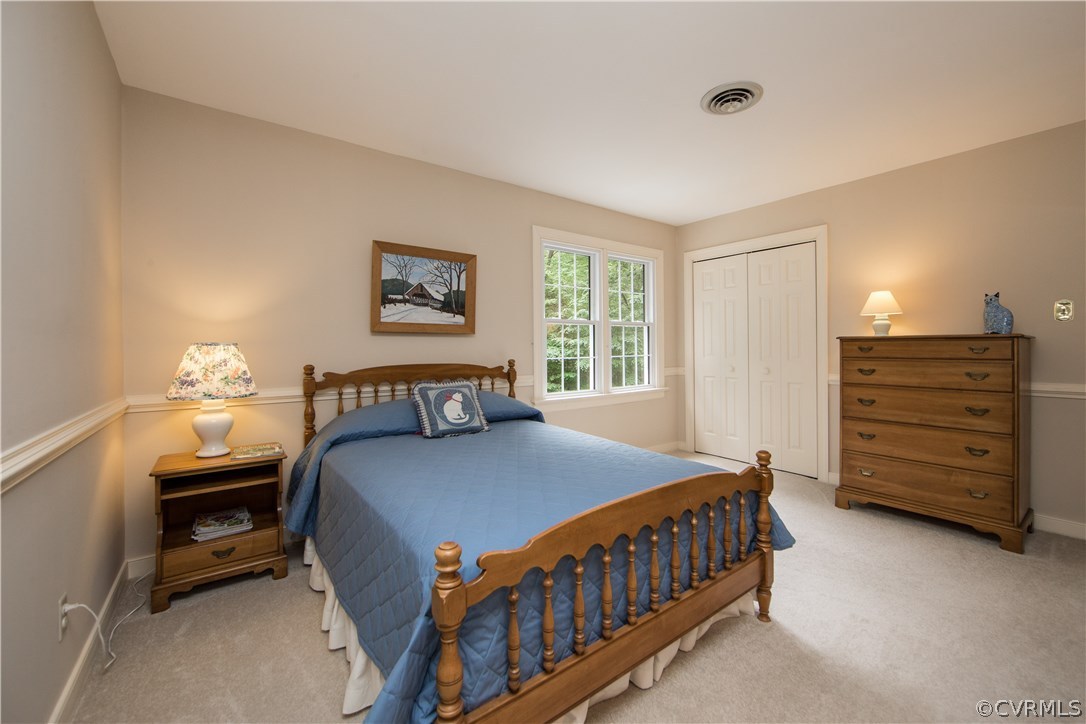 13639 Solstice Cl Midlothian, VA 23113 - Photo 33 of 46 a bedroom with a bed and a window