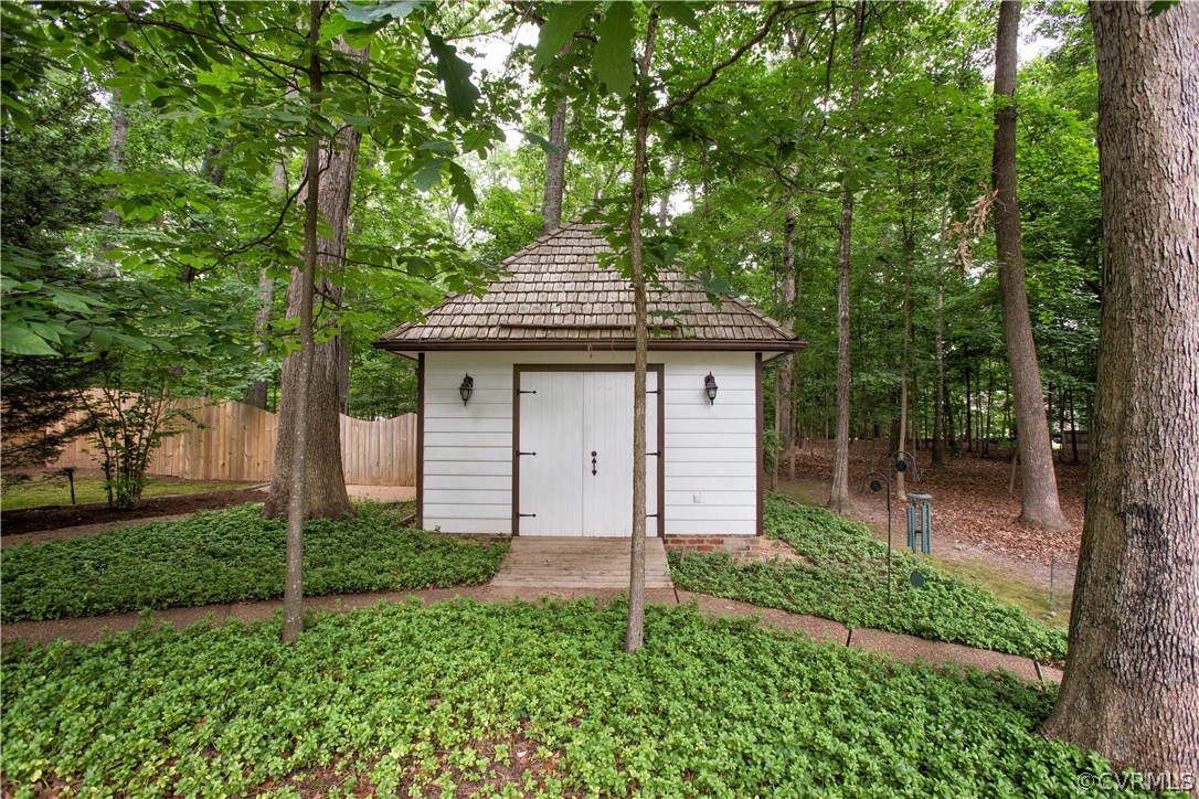 13639 Solstice Cl Midlothian, VA 23113 - Photo 44 of 46 a front view of a house with a garden