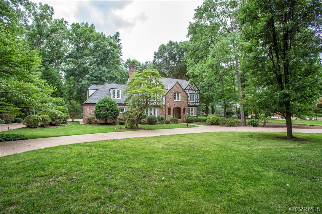 13639 Solstice Cl Midlothian, VA 23113 - Photo 46 of 46 a front view of a house with a garden