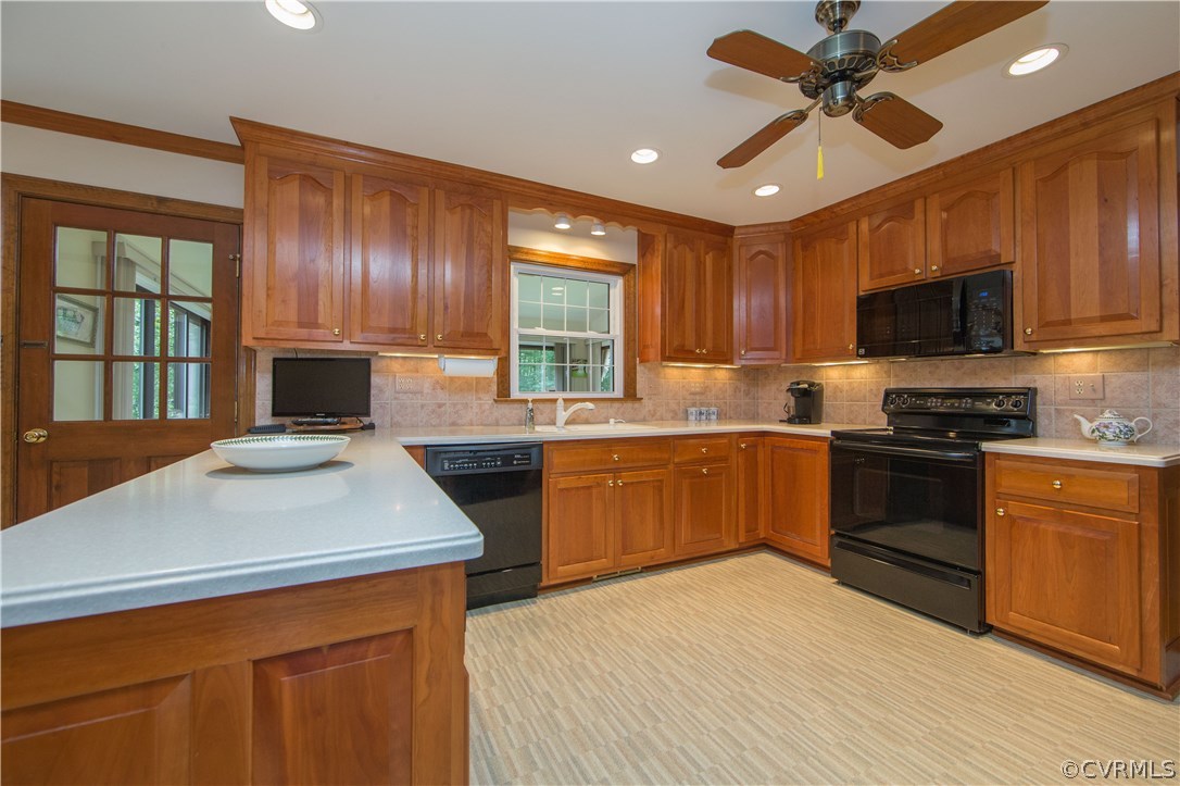 13639 Solstice Cl Midlothian, VA 23113 - Photo 9 of 46 a kitchen with a stove sink and microwave