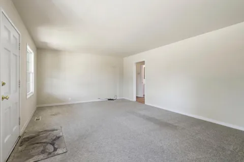 an empty room with an entryway