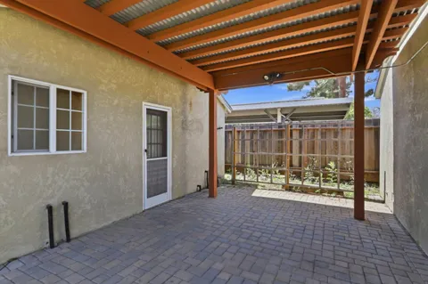 a backyard of a house with lots of green space