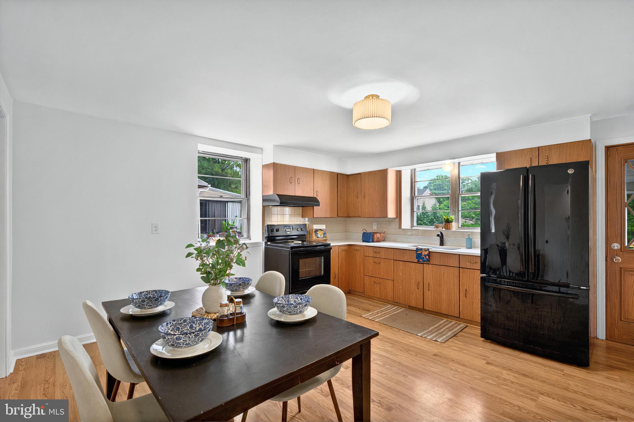 3 Arbor Lea Road Lansdowne, PA 19050 - Photo 11 of 32 a kitchen with furniture and a refrigerator