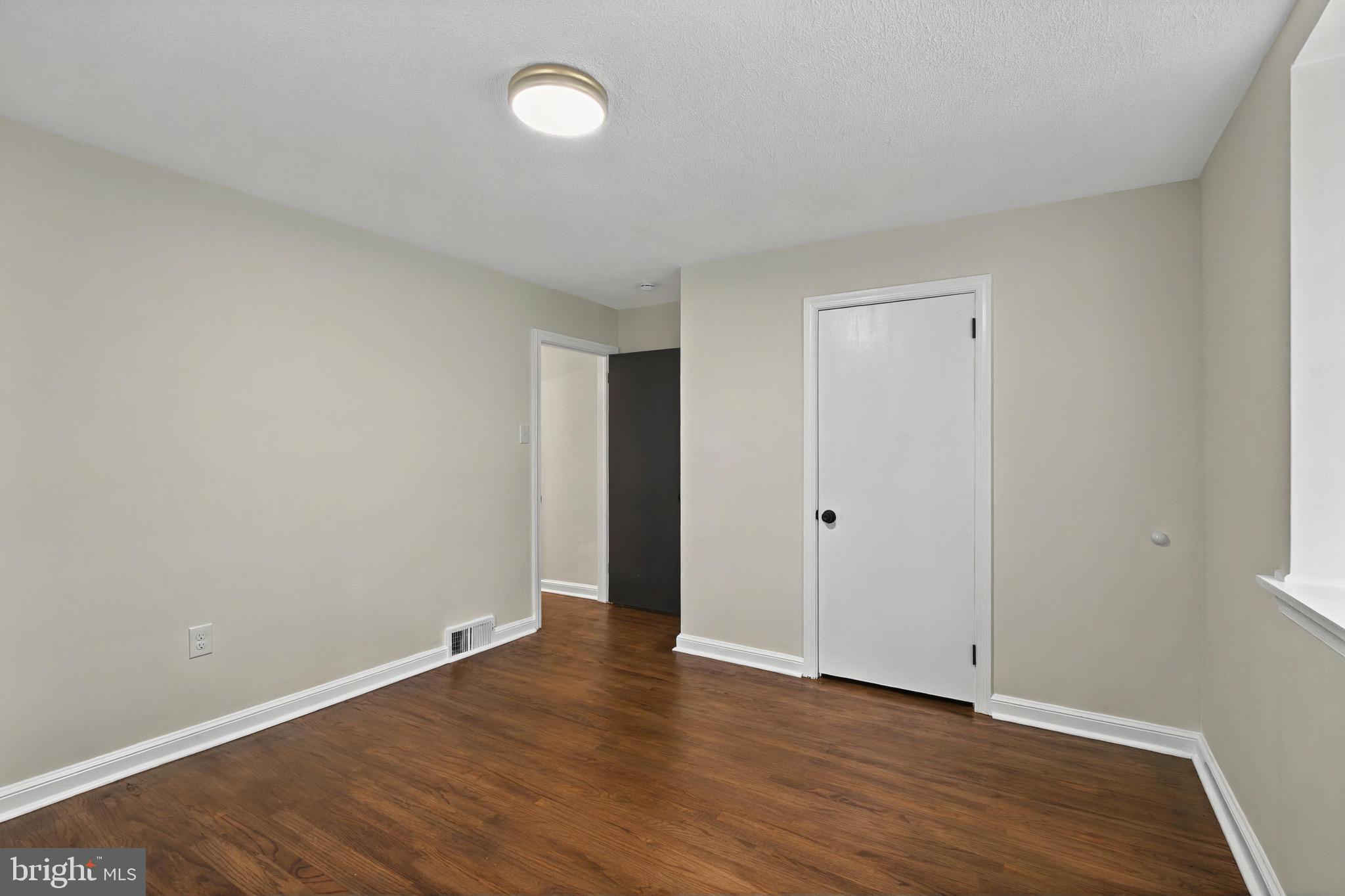 3 Arbor Lea Road Lansdowne, PA 19050 - Photo 21 of 32 a view of an empty room with wooden floor