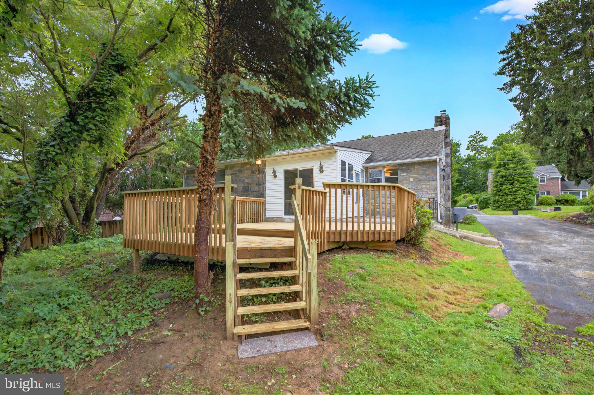 3 Arbor Lea Road Lansdowne, PA 19050 - Photo 26 of 32 a view of a house with a yard and deck