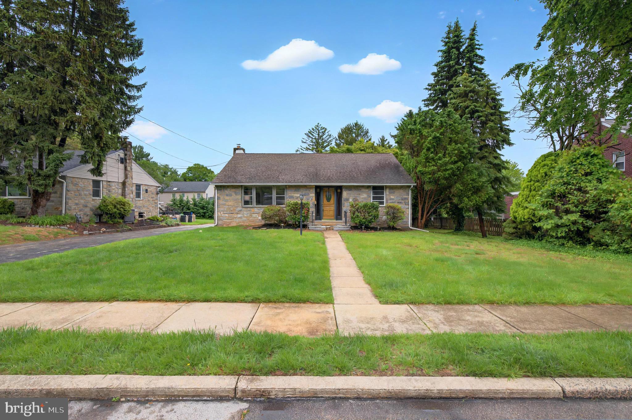 3 Arbor Lea Road Lansdowne, PA 19050 - Photo 3 of 32 a front view of a house with a yard