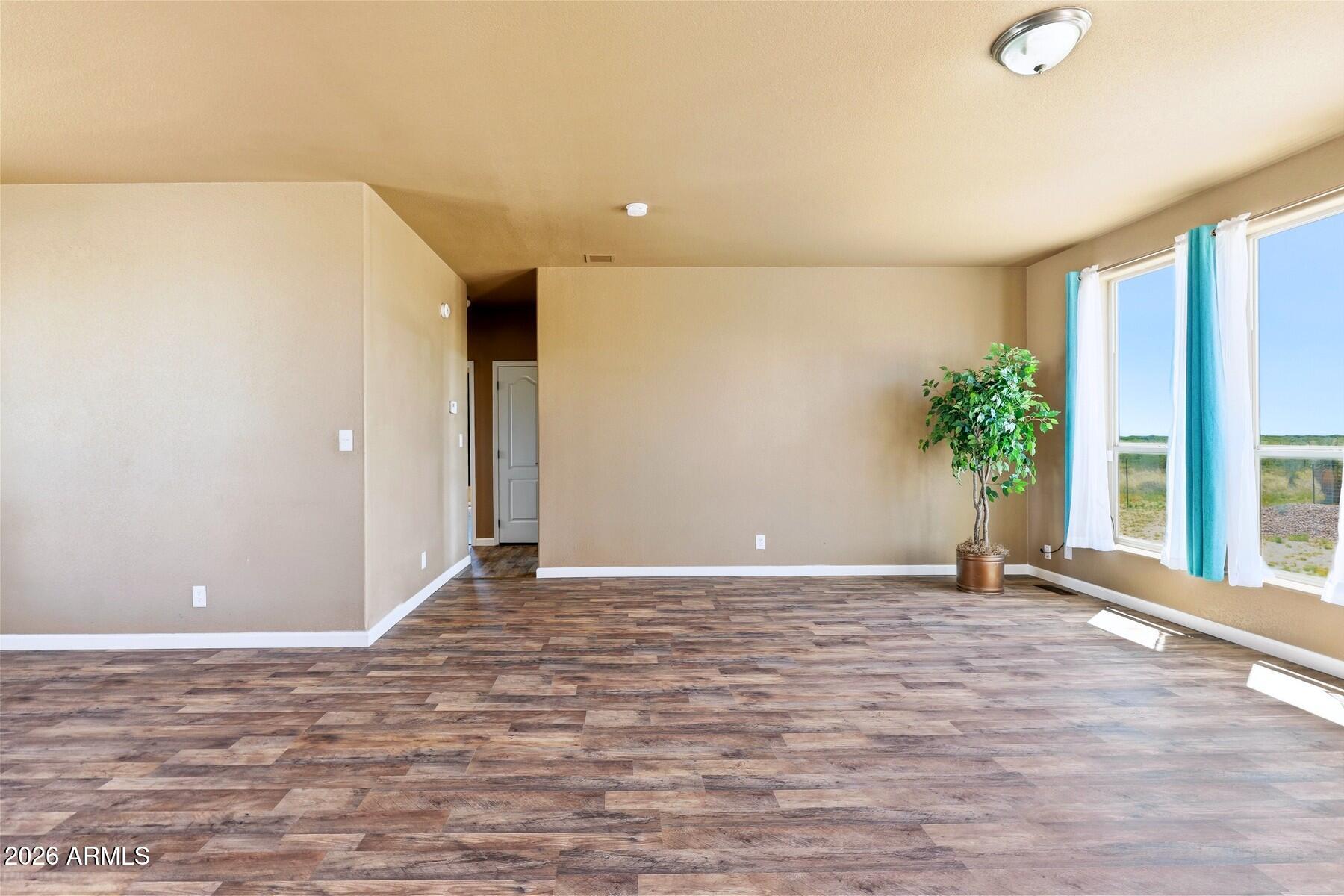 3216 North Mesquite Road Cochise, AZ 85606 - Photo 20 of 39 a view of an empty room with a window
