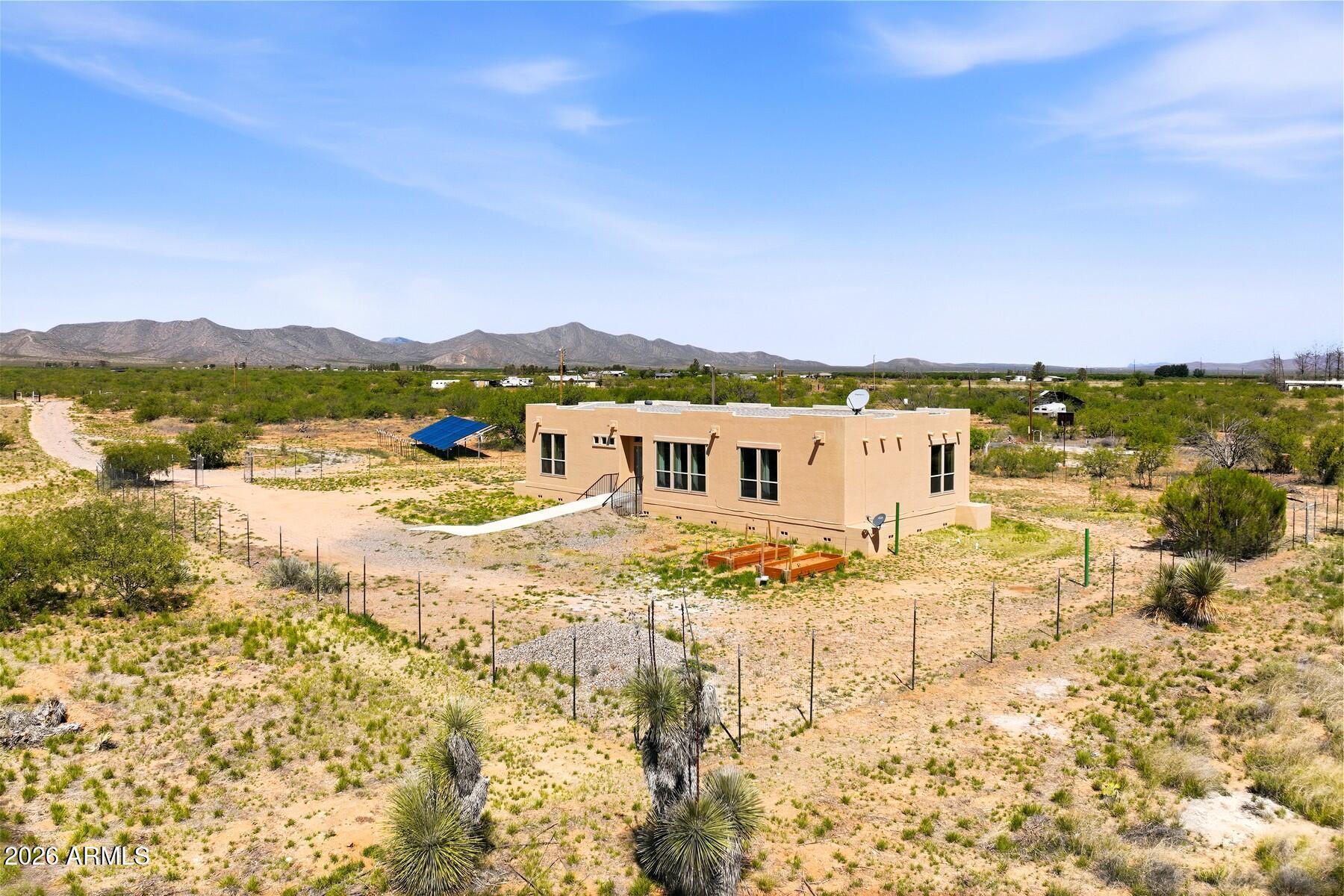 3216 North Mesquite Road Cochise, AZ 85606 - Photo 39 of 39 a view of residential houses with outdoor space and trees