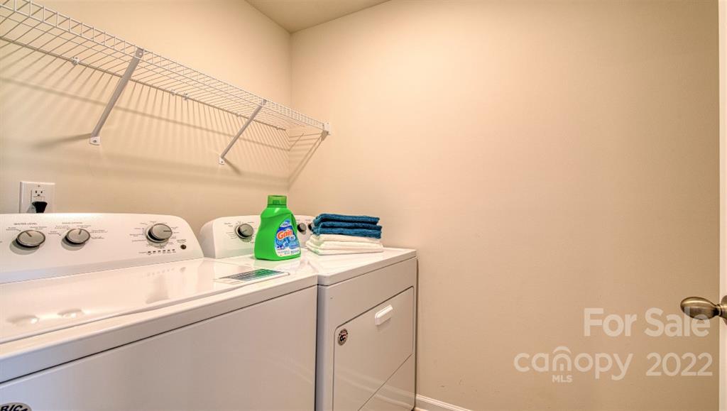 82 Creekview Road Hendersonville, NC 28792 - Photo 34 of 37 a utility room with dryer and washer