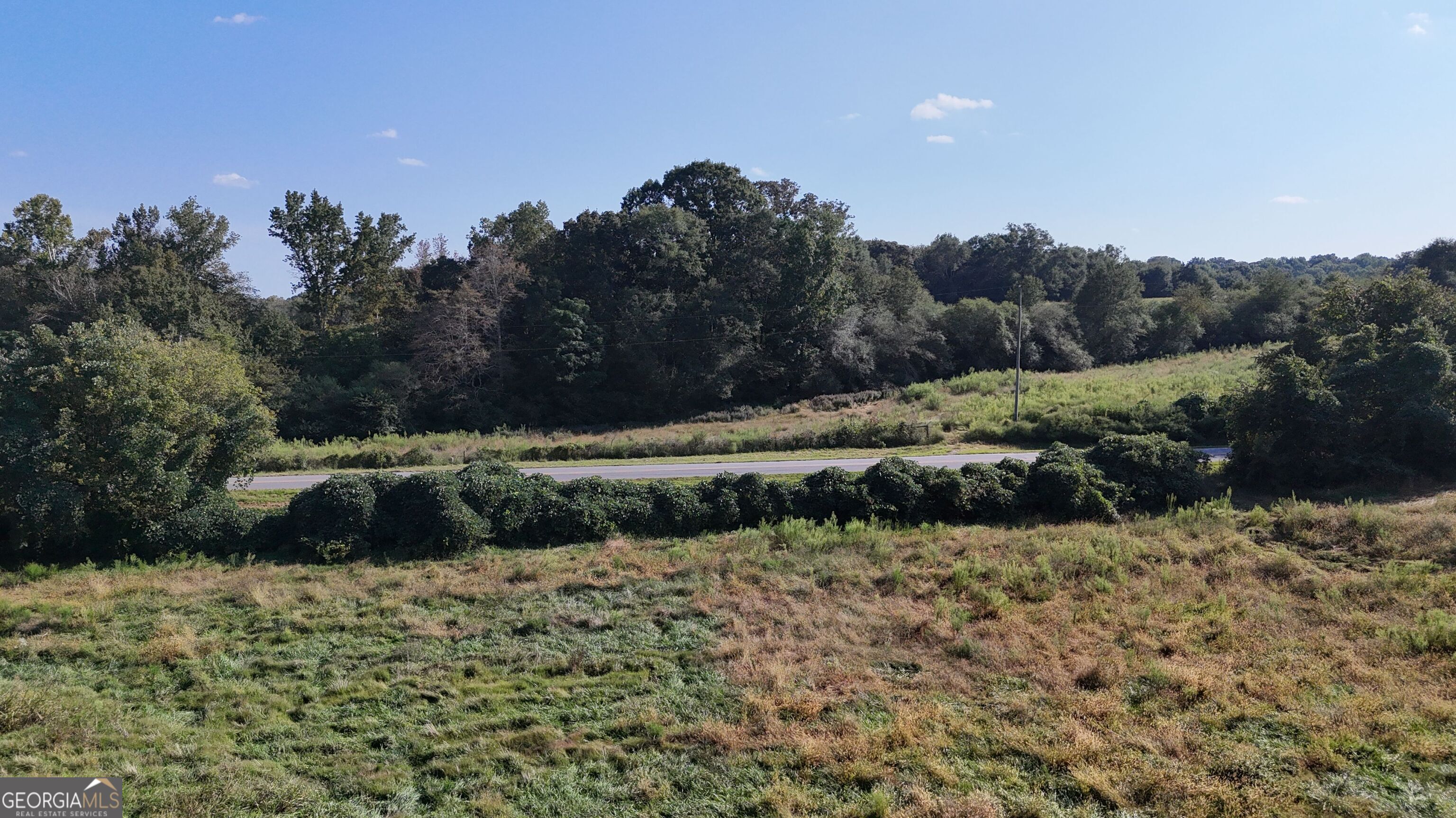 15 West L Williams Road Commerce, GA 30530 - Photo 14 of 41 a view of a yard with an outdoor space