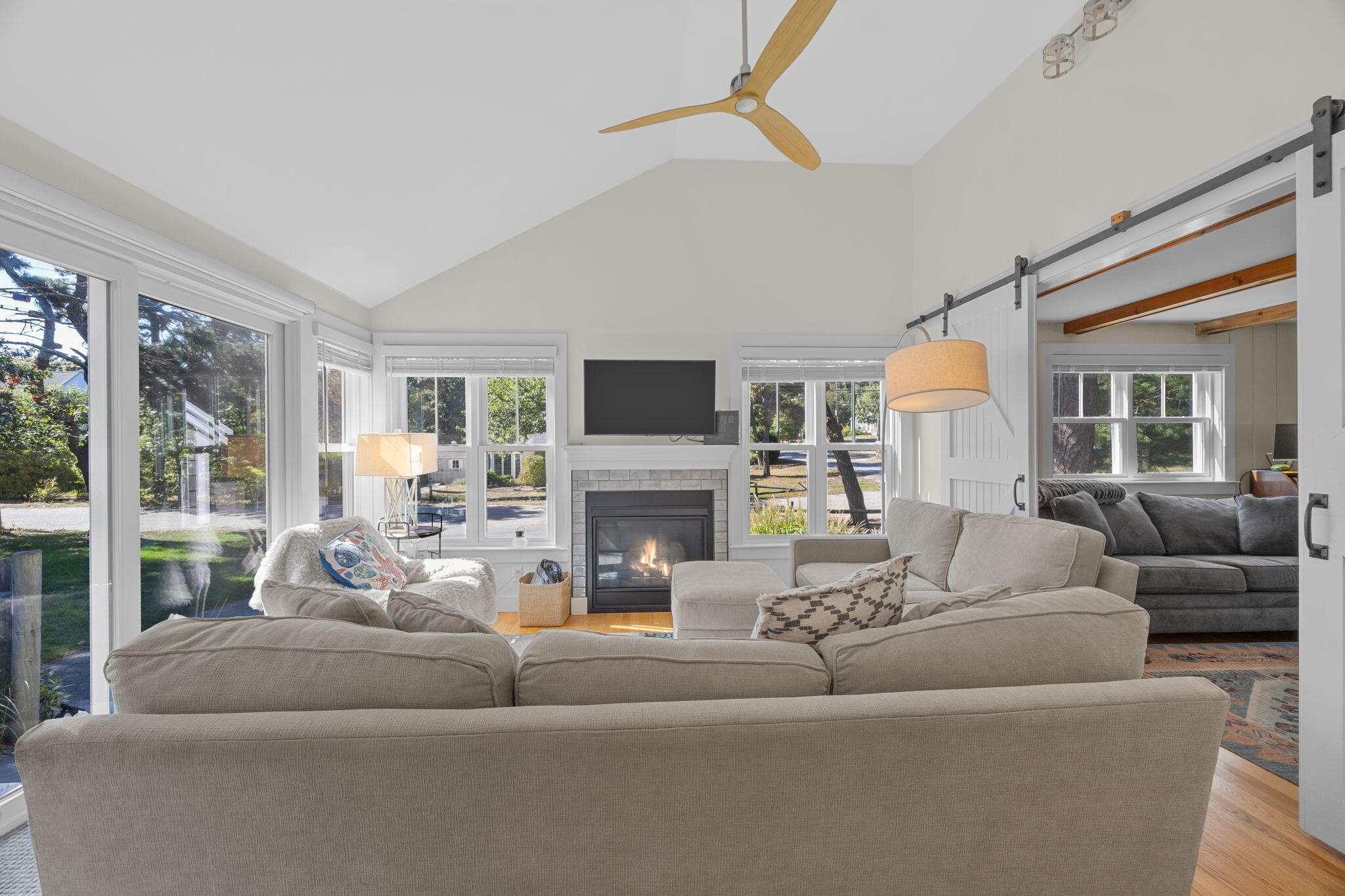 25 Robbins Road Harwich, MA 02646 - Photo 12 of 33 a living room with furniture and a fireplace