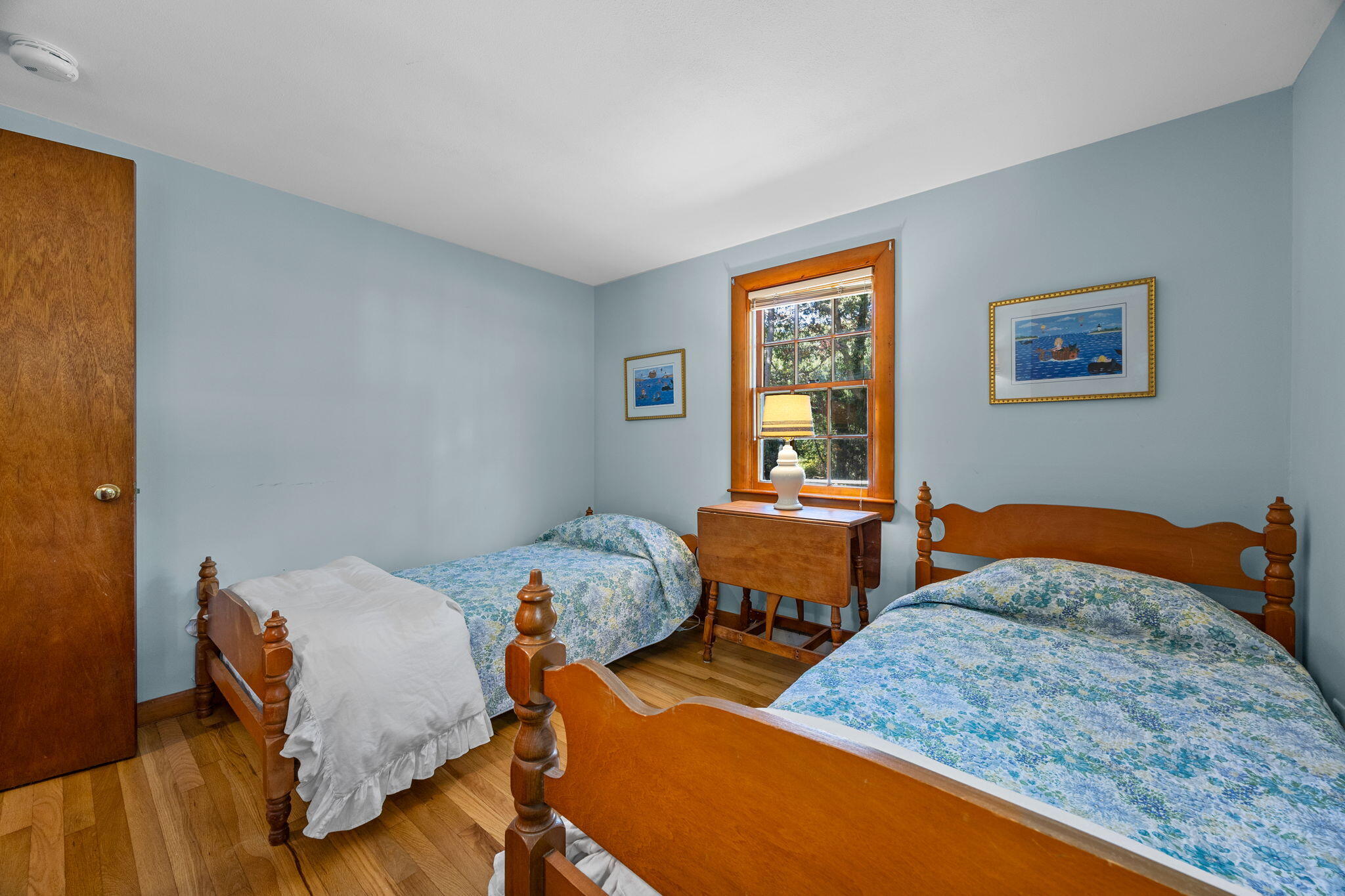 25 Robbins Road Harwich, MA 02646 - Photo 20 of 33 a bedroom with two beds and wooden floor