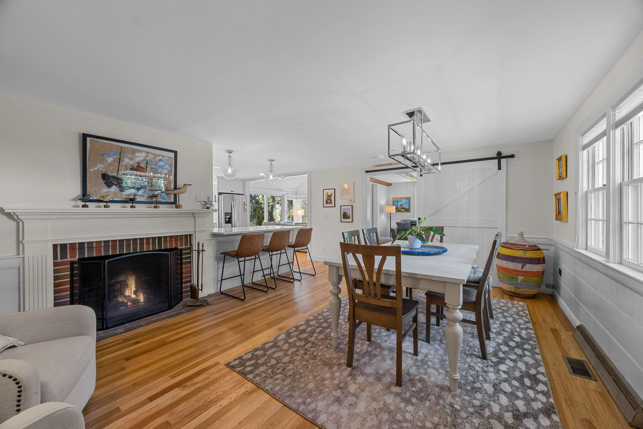 25 Robbins Road Harwich, MA 02646 - Photo 3 of 33 a view of a livingroom with furniture and a fireplace