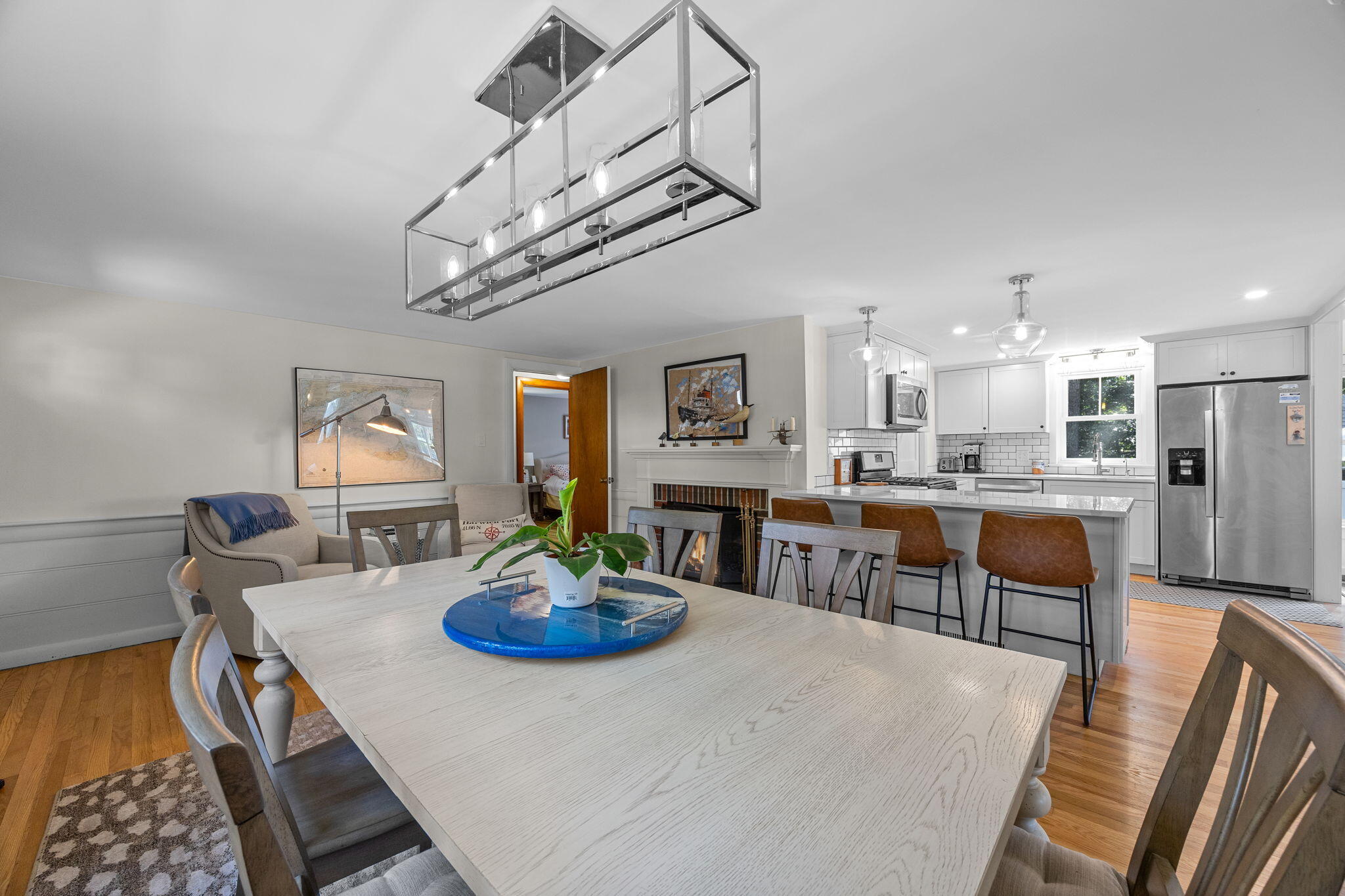 25 Robbins Road Harwich, MA 02646 - Photo 5 of 33 a view of a dining room with furniture and a chandelier