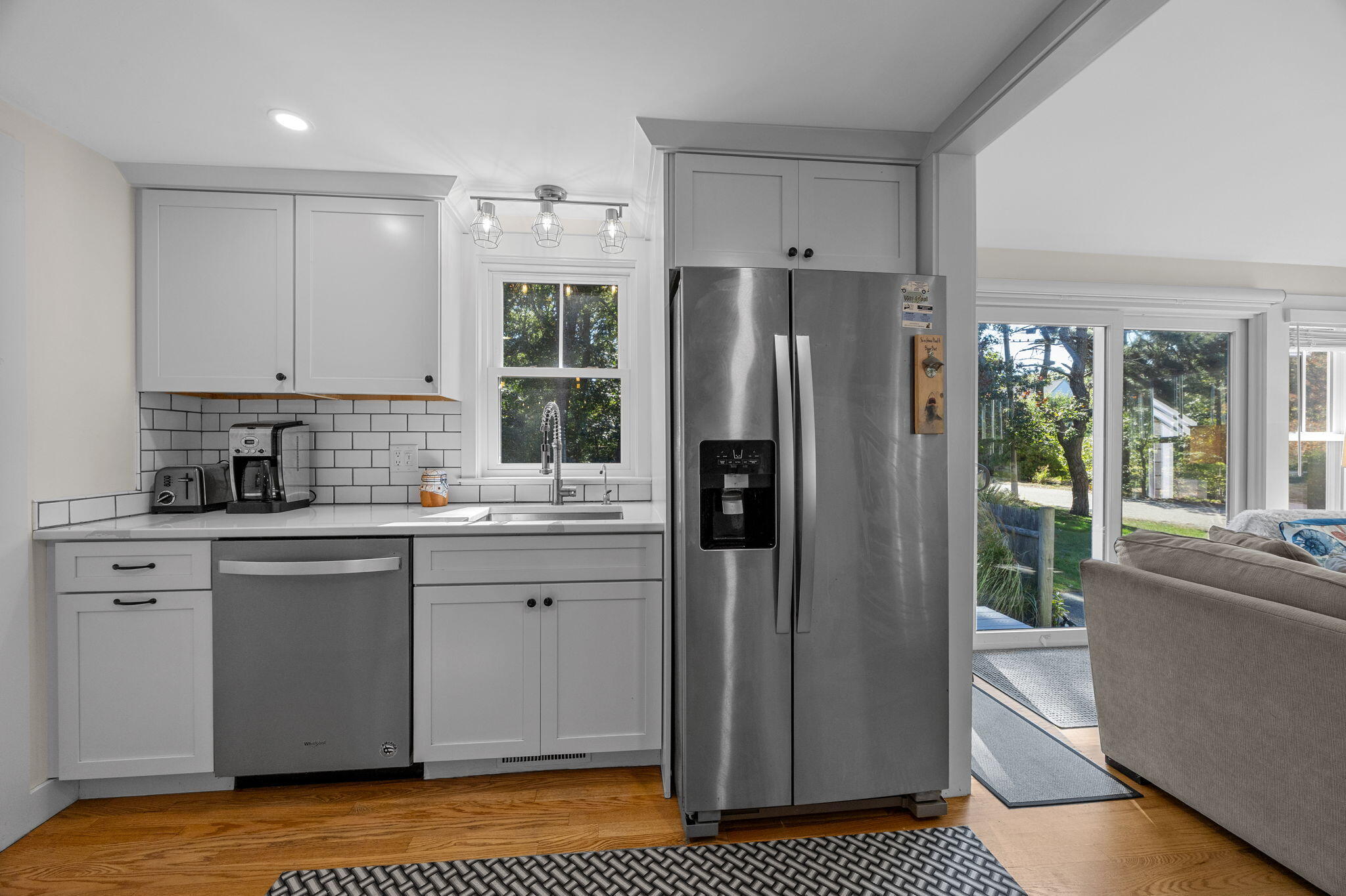25 Robbins Road Harwich, MA 02646 - Photo 7 of 33 a kitchen with stainless steel appliances granite countertop a refrigerator and a sink