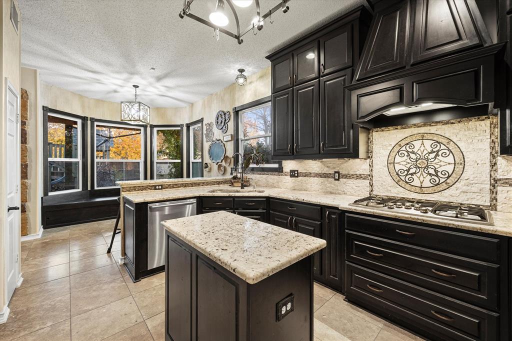 7410 Arborside Drive Rowlett, TX 75089 - Photo 11 of 39 Beautifully updated kitchen will please any chef!