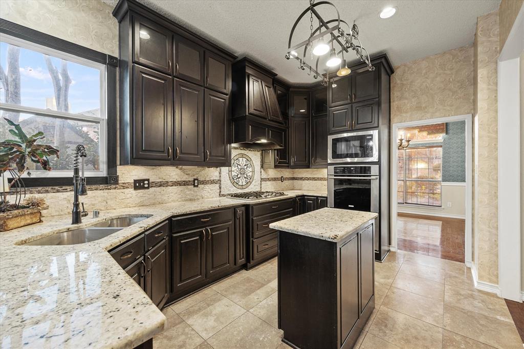 7410 Arborside Drive Rowlett, TX 75089 - Photo 12 of 39 This kitchen will put a smile on your chef's face!