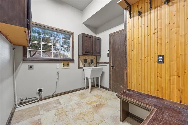 a room with furniture and a window