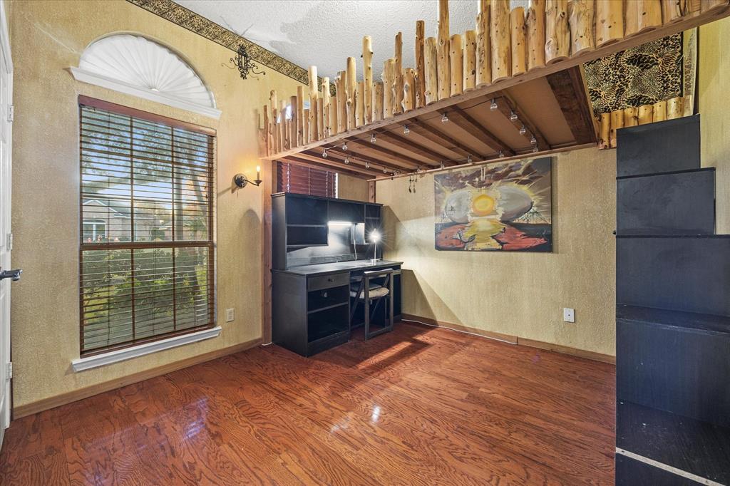 7410 Arborside Drive Rowlett, TX 75089 - Photo 17 of 39 Auxiliary bedroom includes roomy closet and loft