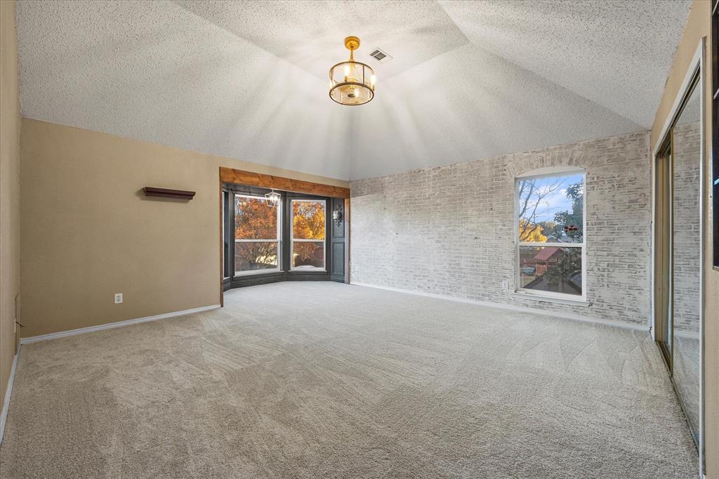 7410 Arborside Drive Rowlett, TX 75089 - Photo 21 of 39 Huge master bedroom includes sitting area