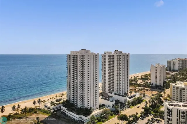 a view of a city with tall buildings