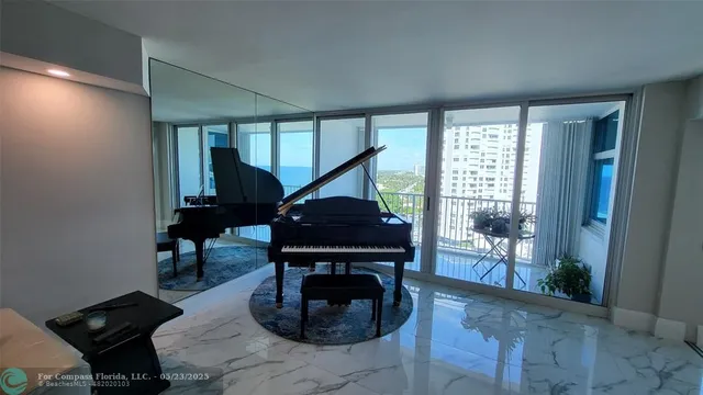 a bathroom with a granite countertop sink a mirror and a