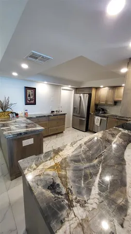 a view of swimming pool with outdoor seating