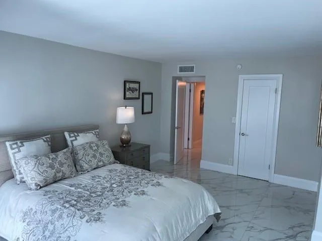 a view of outdoor space with signage and flags