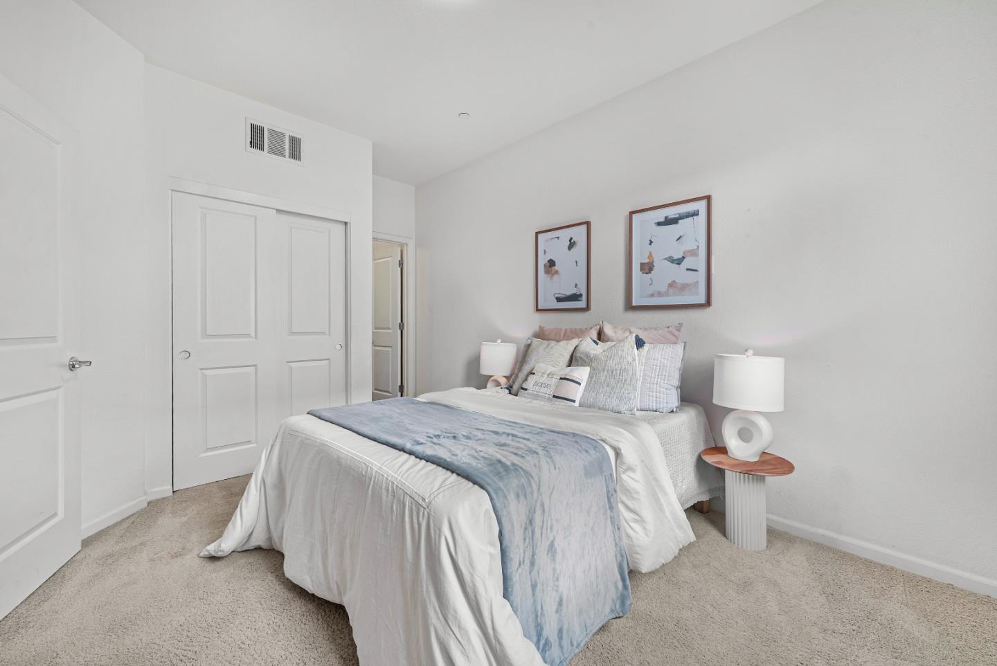 2753 Ferrara Circle San Jose, CA 95111 - Photo 13 of 46 a bedroom with a bed and a painting on the wall