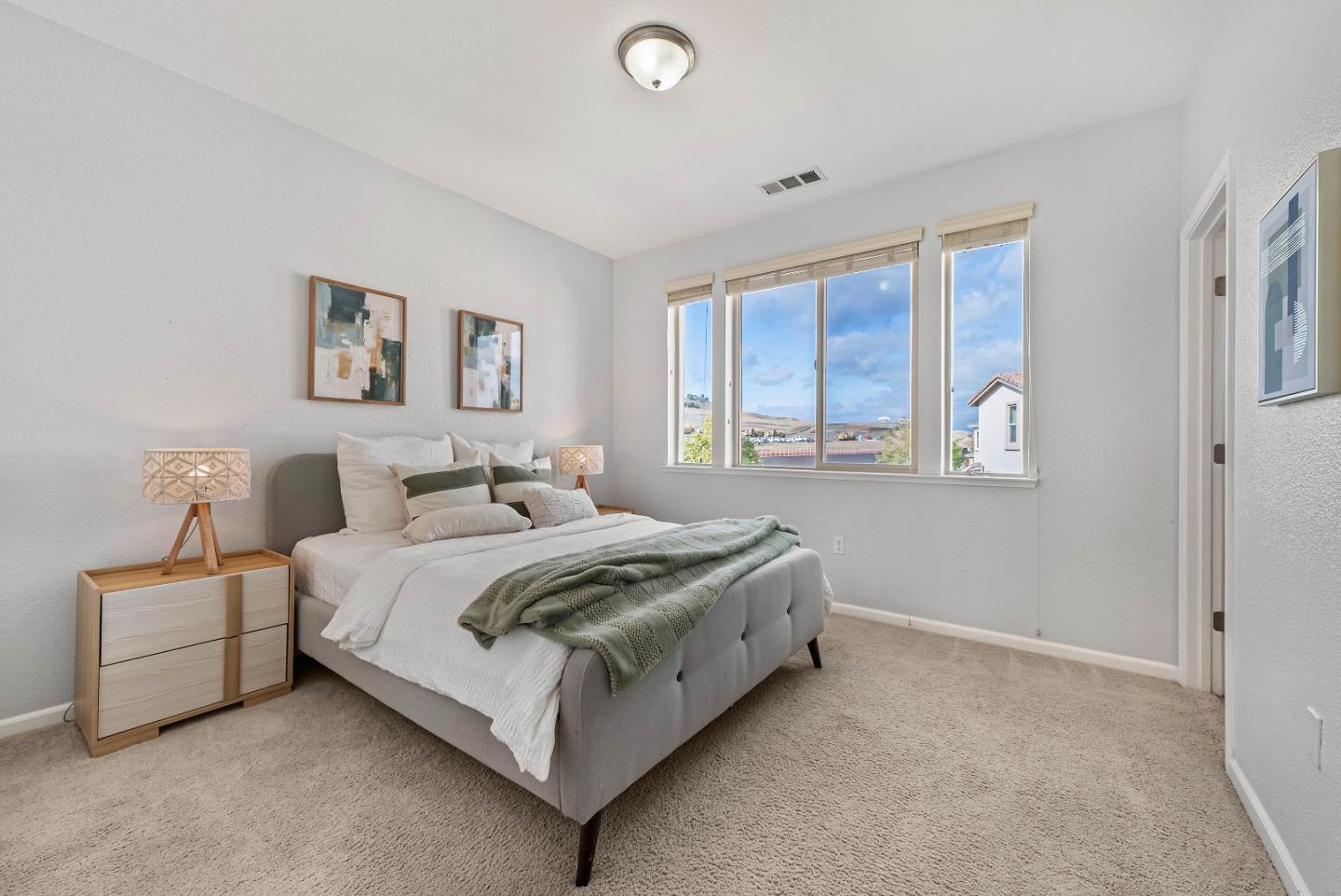 2753 Ferrara Circle San Jose, CA 95111 - Photo 18 of 46 a bed room with a bed and a window