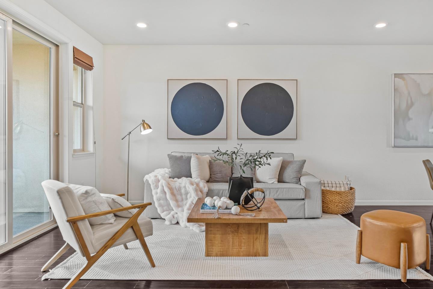 2753 Ferrara Circle San Jose, CA 95111 - Photo 2 of 46 a living room with a couch and a table with wooden floor