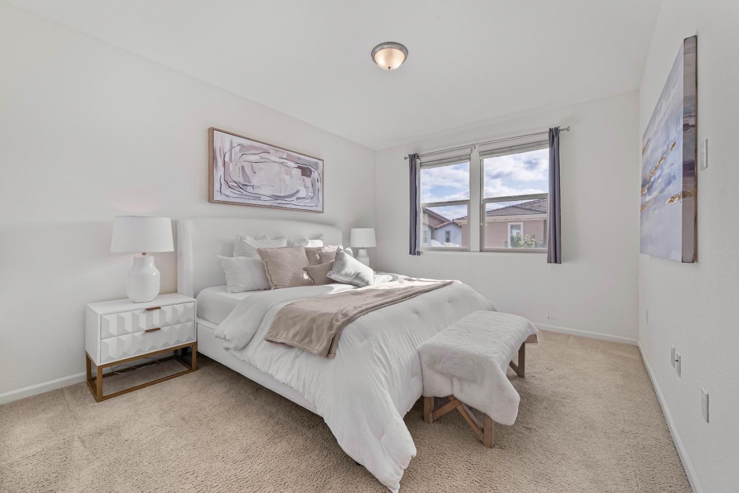 2753 Ferrara Circle San Jose, CA 95111 - Photo 23 of 46 a spacious bedroom with a bed and a window