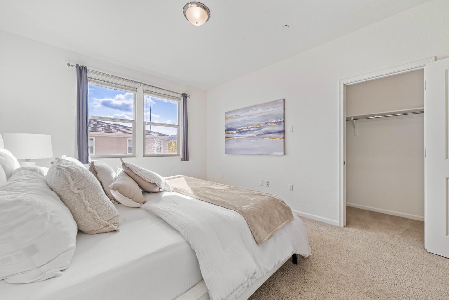 2753 Ferrara Circle San Jose, CA 95111 - Photo 25 of 46 a bedroom with a bed and a large mirror