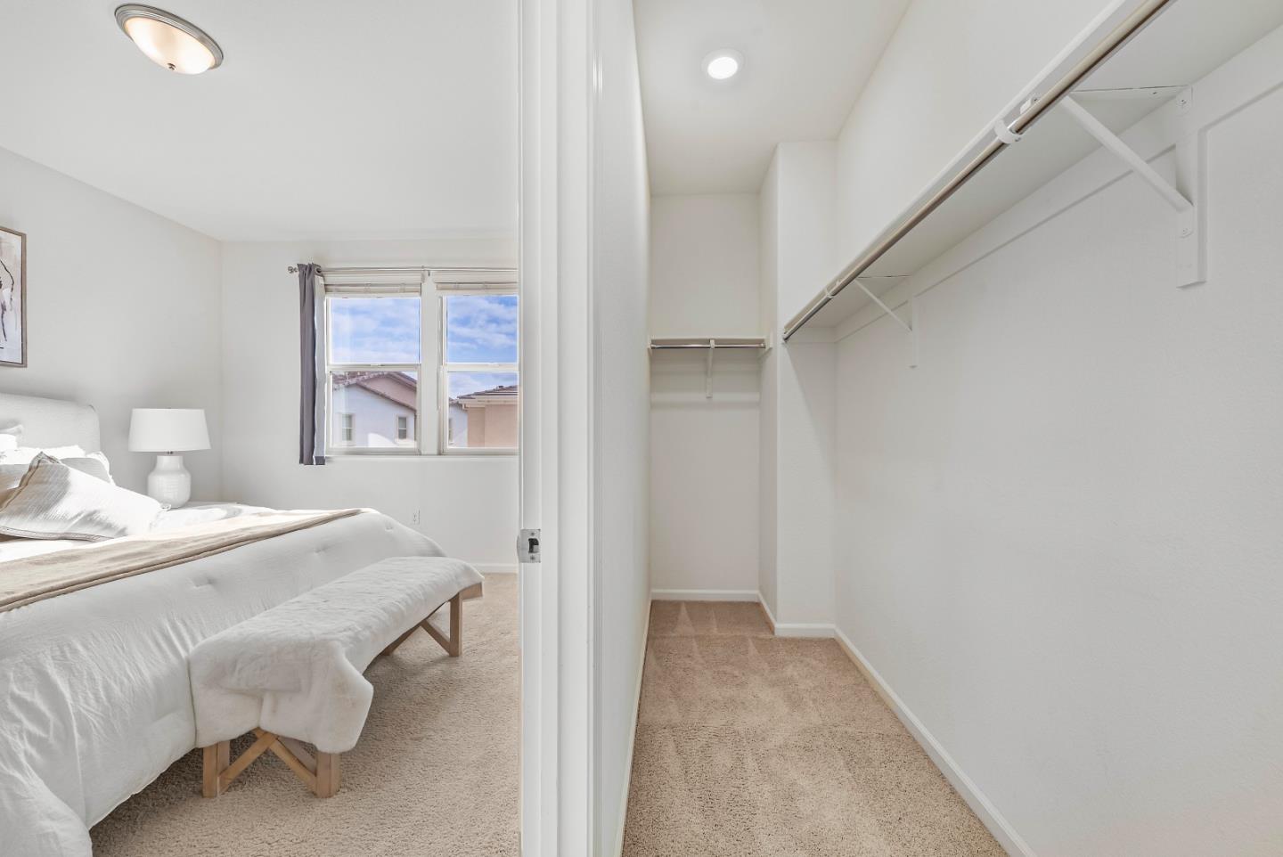 2753 Ferrara Circle San Jose, CA 95111 - Photo 26 of 46 a bedroom with a bed and a painting on the wall