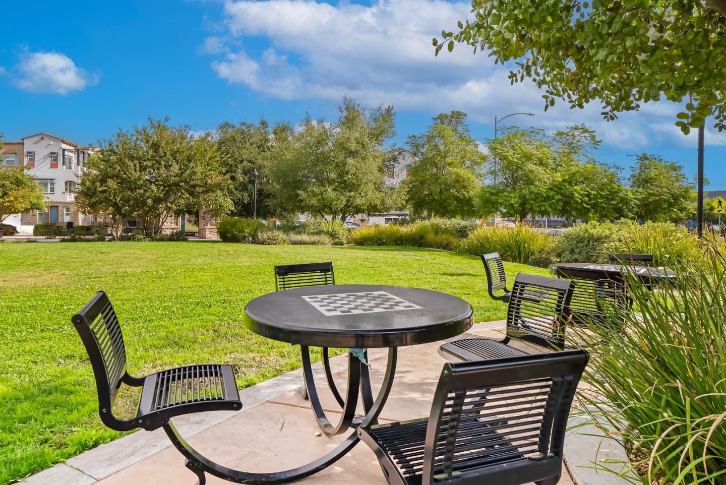 2753 Ferrara Circle San Jose, CA 95111 - Photo 37 of 46 a view of a chairs and table in patio with a lake view