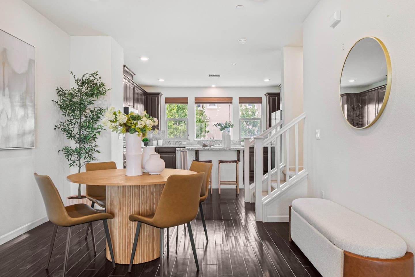 2753 Ferrara Circle San Jose, CA 95111 - Photo 6 of 46 a dining room with furniture potted plants and wooden floor